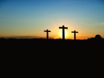 Sunrise over three crosses